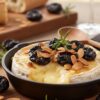 camembert rôti aux pruneaux et aux amandes